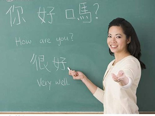 asian_female_teacher_writing_c3.jpg