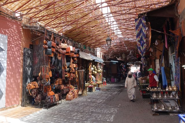 Souk with Merchant.JPG