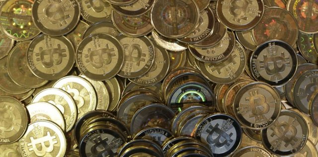 7055073-bitcoin-comment-se-porte-vraiment-la-celebre-monnaie-virtuelle.jpg