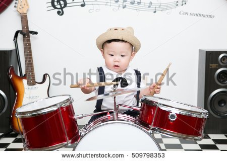 stock-photo-asian-infant-playing-drum-in-studio-509798353.jpg