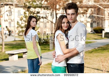 stock-photo-outdoor-photo-of-a-young-woman-jealous-on-a-happy-couple-99998672.jpg
