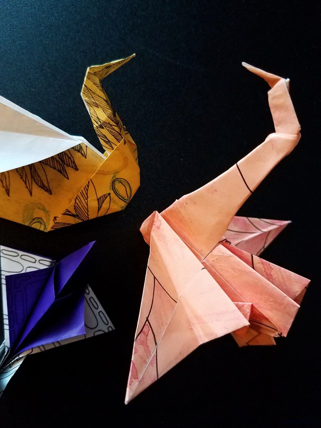 steemit-enternamehere-origami-journey-9-swans-peach-yellow-purple.jpg