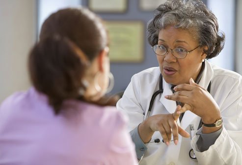 getty_rf_photo_of_female_doctor_talking_to_patient.jpg