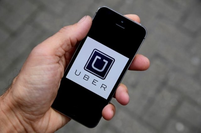 1489753904_uber-app-logo-seen-mobile-telephone.jpg