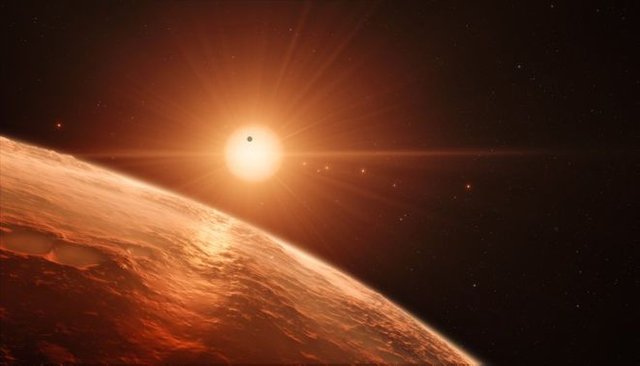 trappist-1-system-surface-artists-impression.jpg