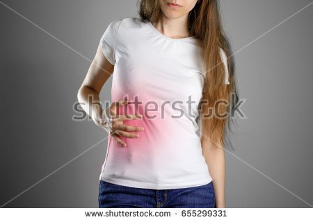 stock-photo-a-woman-holds-the-liver-pain-in-the-abdomen-cirrhosis-of-the-liver-sore-point-highlighted-in-red-655299331.jpg