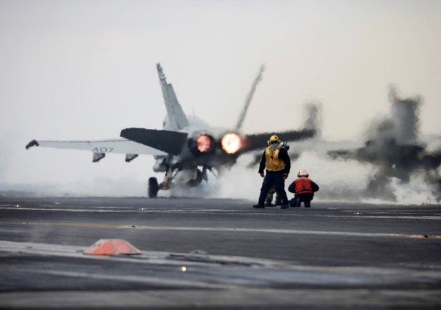 us-navy-military-aircraft-carrier-jet-drill-exercise-south-korea-east-sea-march-2017-reuters-rtx30xhd.jpg