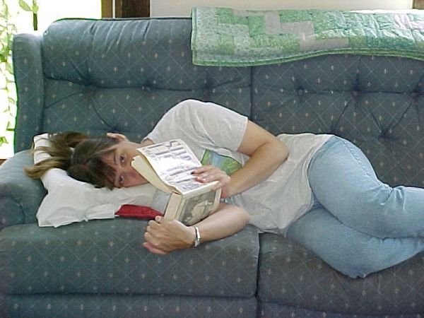 Pam.reading.on.couch crop.May.03.jpg