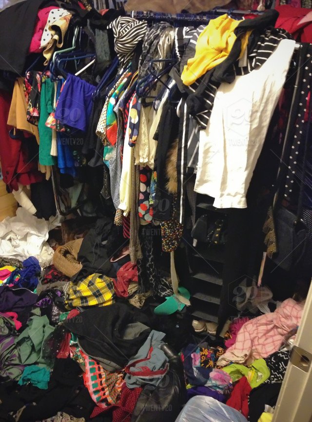 stock-photo-fashion-pile-clothes-wardrobe-mess-disorganized-hanging-rack-02ba28b7-3177-46a0-861a-5bfe80ae0d6f.jpg