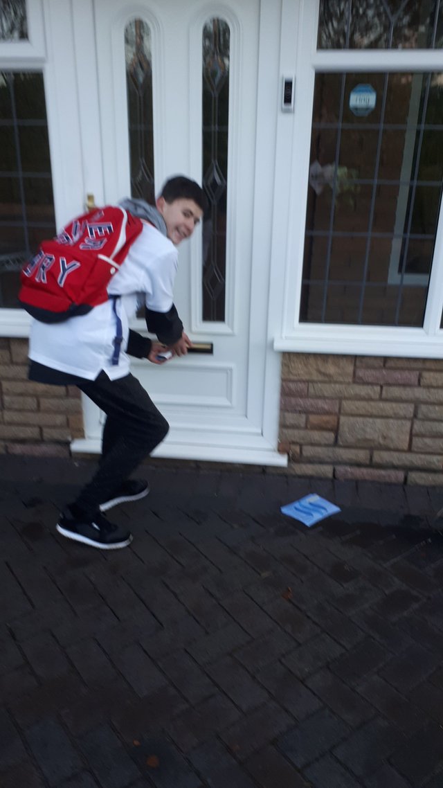 Me sticking a leaflet through a door .jpg