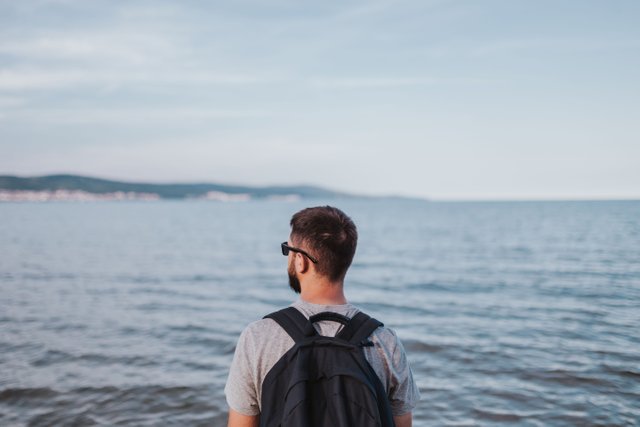 kaboompics_Man looking out to sea.jpg