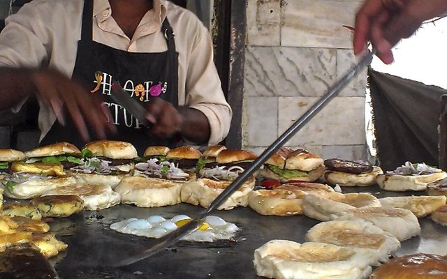 Worker-prepares-bun-kebabs-at-Super-Nursery-Bun-Kebab-I.jpg