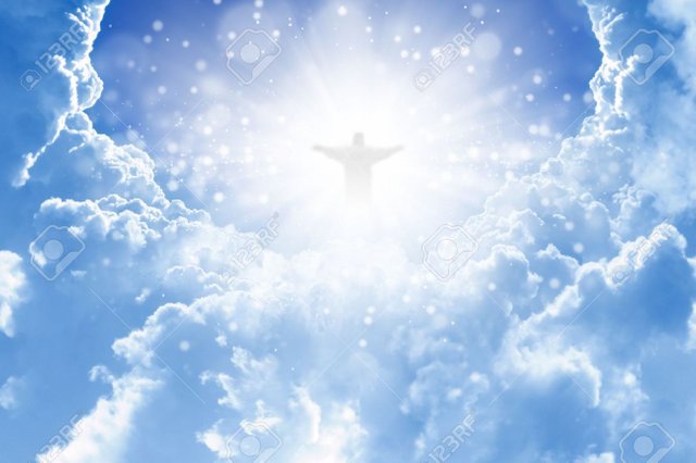 15070803-Jesus-Christ-in-blue-sky-with-clouds-heaven-Stock-Photo.jpg