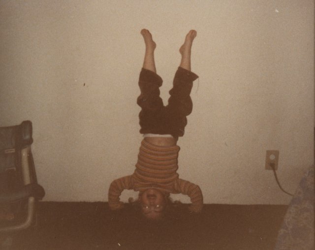 1983-10 - Katie on her head - Way to get a head