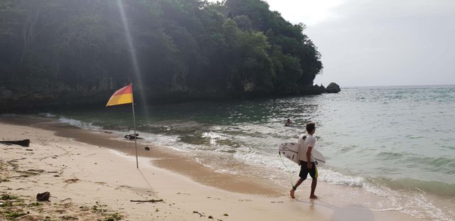 Padang Padang beach is a favourite amongst the tourists and locals for surfing