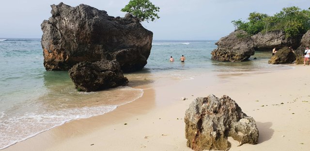 The water is clean and safe for swimming at Padang Padang beach