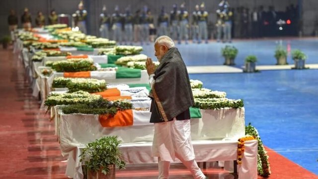 Indian PM Narendra Modi paying his respects to the martyrs