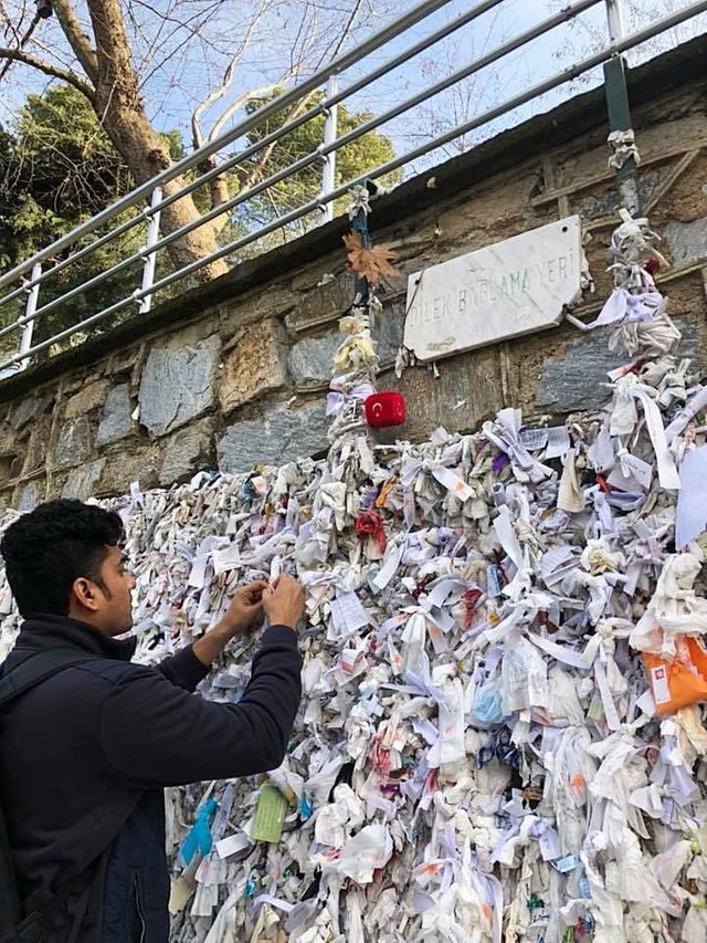 Me making a wish at the famous Wishing Wall