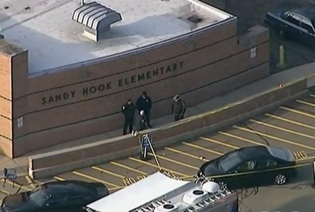 Police arrive at Sandy Hook Elementary, after the shooting on December 14, 2012. Photo from US state media. Public Domain.