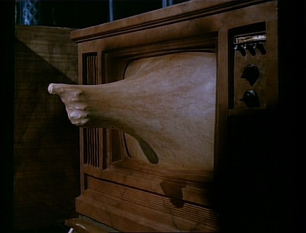 Screenshot from the trailer of the film Videodrome (1983). Public domain.