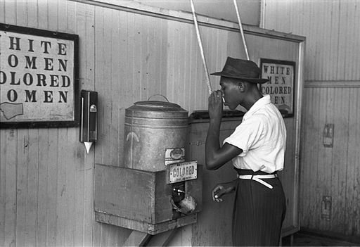 "Colored" drinking fountain; racial segregation in Oklahoma, USA, 1939. Photo by Russell Lee. Public Domain.