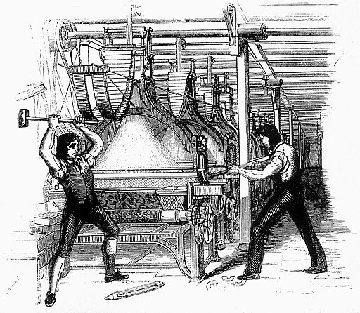 Luddites smashing a loom circa 1812. Public domain.