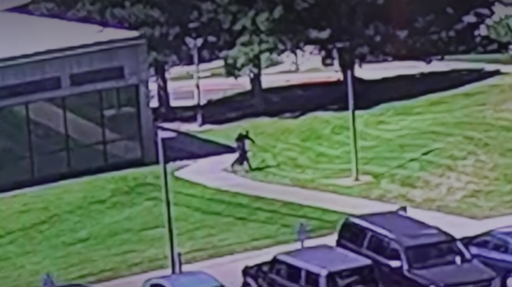 A person of interest leaves the roof after Charlie Kirk was shot and killed.