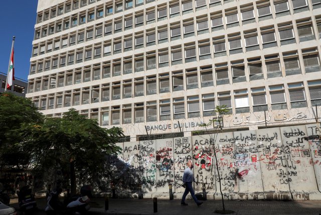 A man walks past the Central Bank building, in Beirut, Lebanon November 12, 2020. (Reuters)