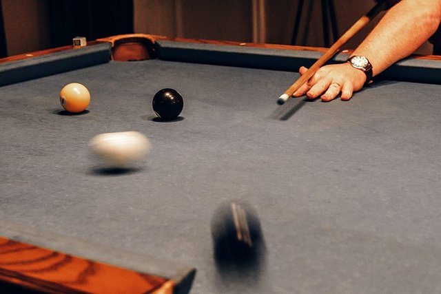 Billiard play