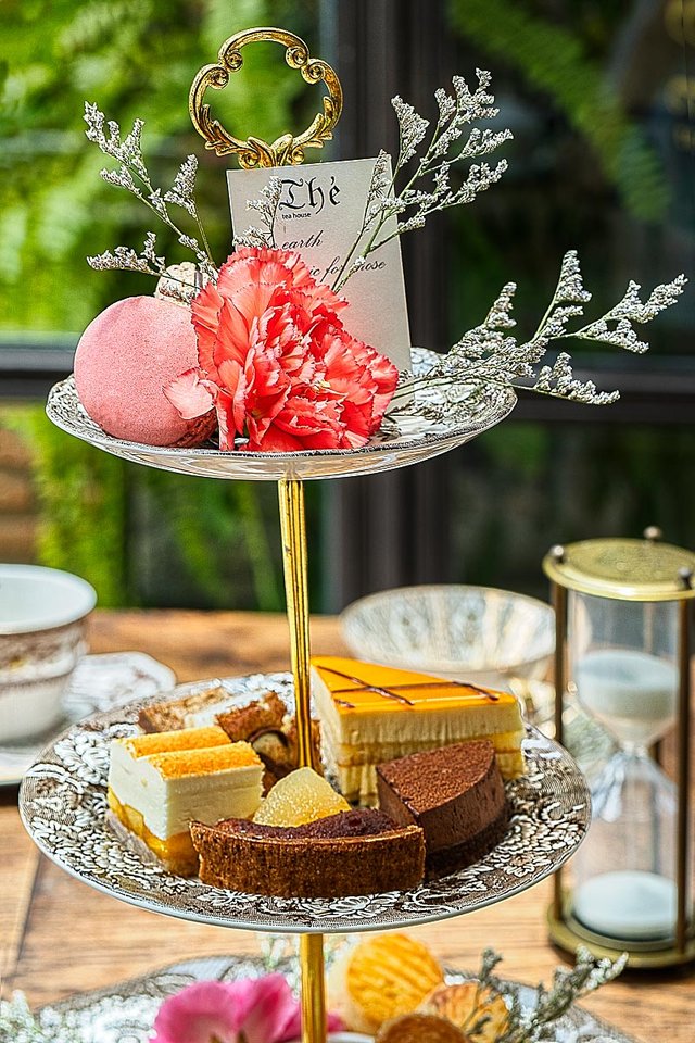 Afternoon tea sweets on a sandwich stand.