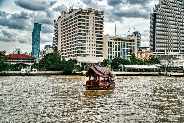 teakwood boat on Chao Phraya river