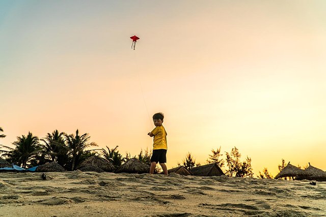 child on cua dai beach