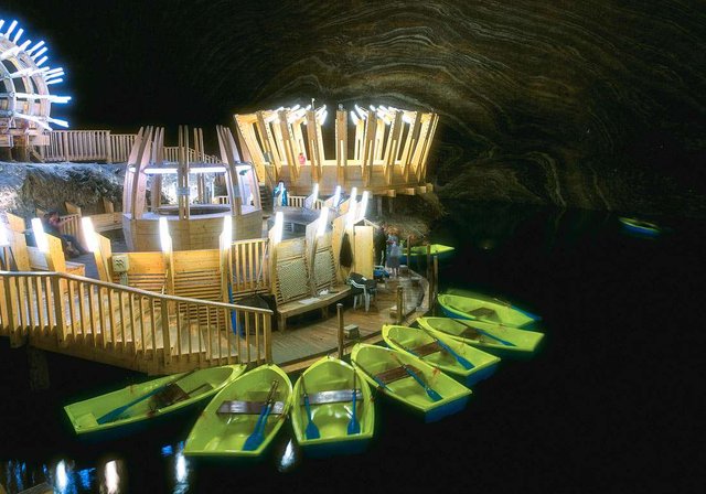 You Can Tour The Subterranean Lake With A Boat in Salina Turda