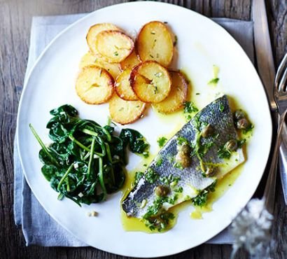 Baked sea bass with lemon caper dressing