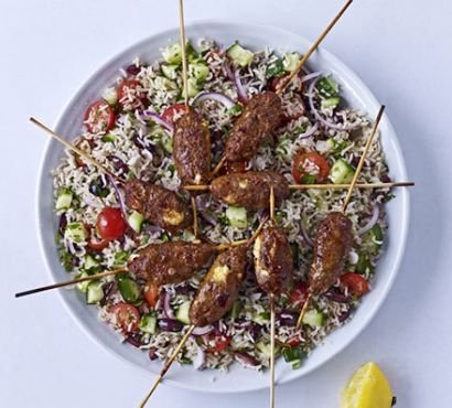 Spicy lamb & feta skewers with Greek brown rice salad