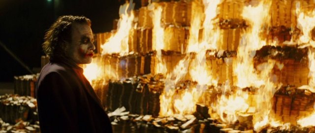 Image of joker-burning-money - bitcoin