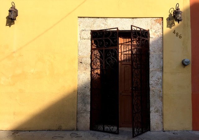 The city is dotted with colonial homes transformed into cozy hotels, often hidden behind massive doors and iron gates.