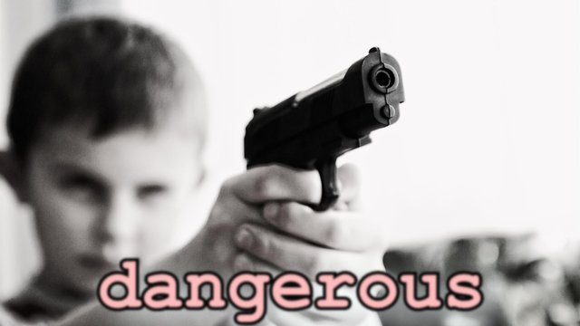 dangerous-child-holding-pistol-gun-firearm-man-world_000000c32eb.jpg