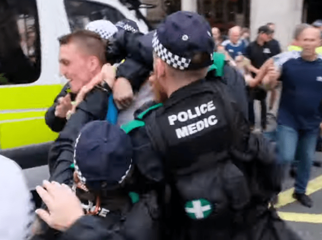 Violent Police Medic Punching Tommy Supporter