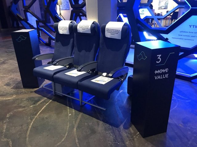 Ripple's Swell conference 2018, xRapid being used demo airplane chairs.