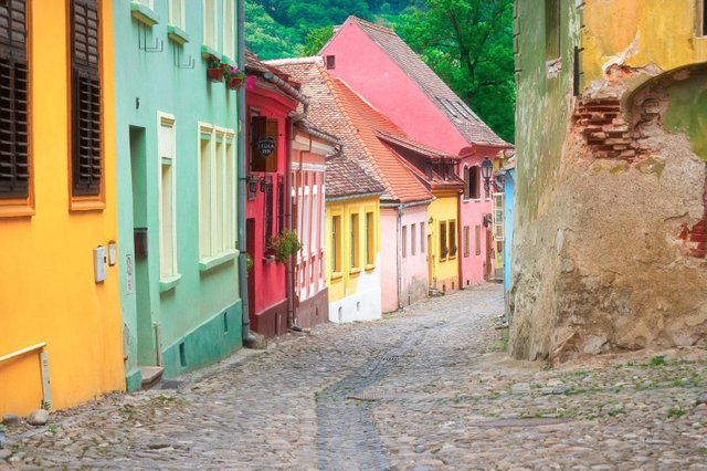 Crayon colored fairy tale houses in Sighisoara, Romania