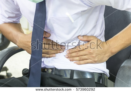 stock-photo-men-wearing-white-shirt-are-abdominal-pain-at-the-workplace-573960292.jpg