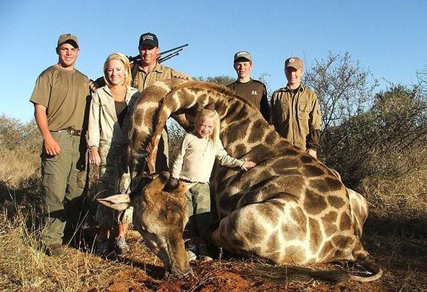 Trophy Hunting Giraffe endangered species africa hunting peta crime.jpg