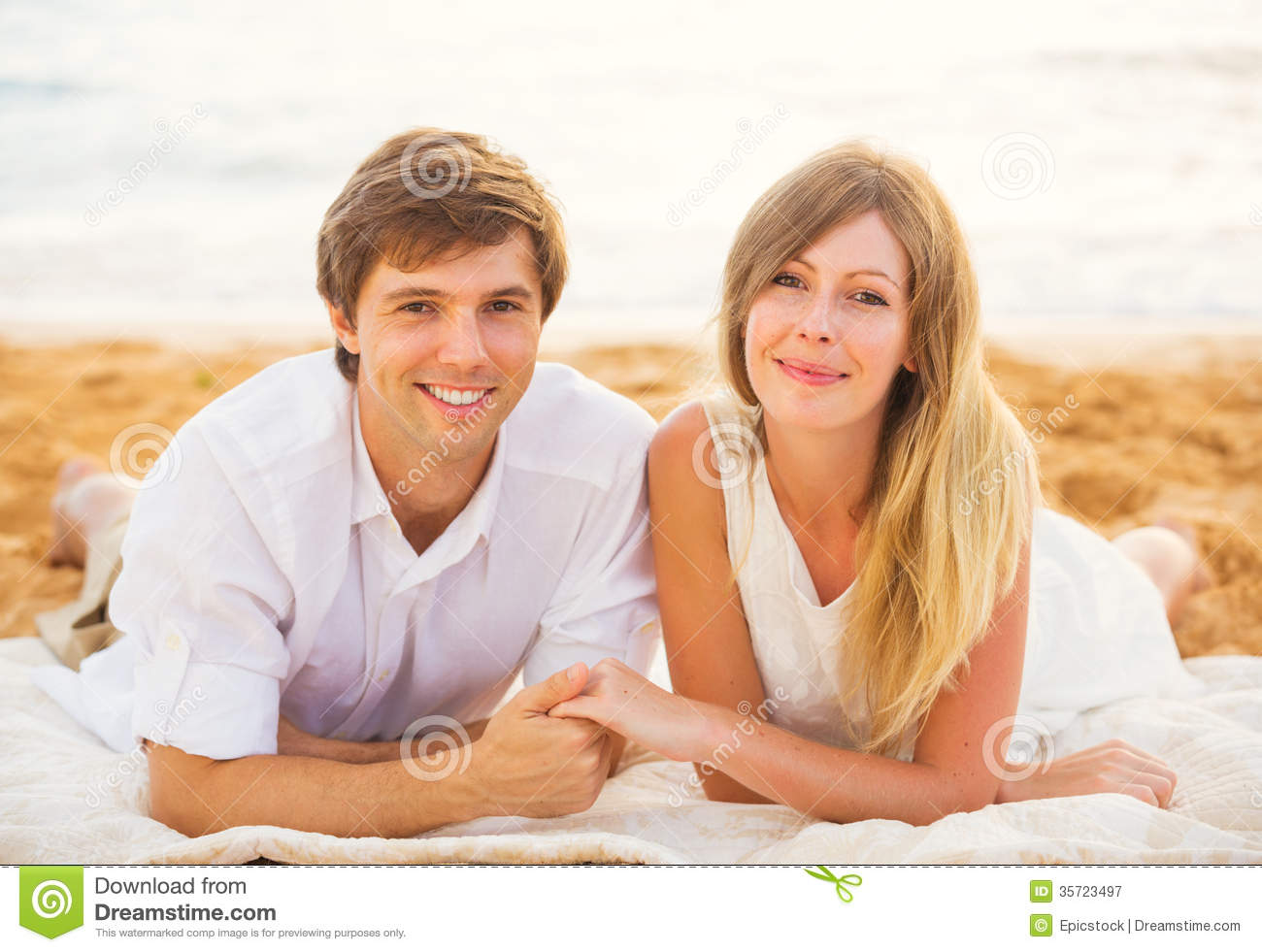 young-couple-love-man-woman-enjoying-romantic-afternoon-women-sunset-beach-35723497.jpg