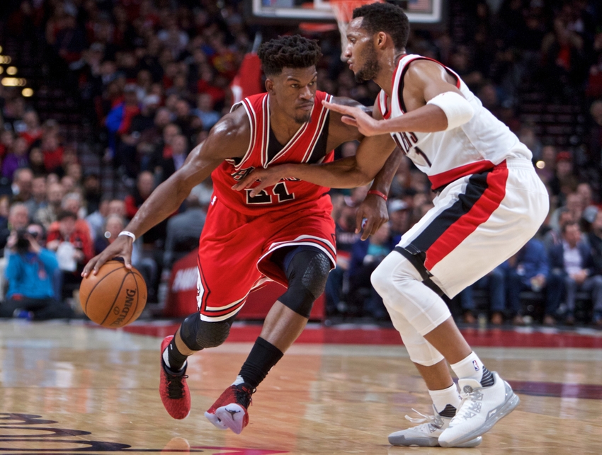 9680607-evan-turner-jimmy-butler-nba-chicago-bulls-portland-trail-blazers.jpg