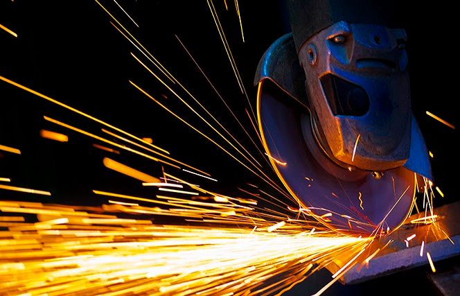 sparks from a metal cutting circular saw - rogovoy report.jpg