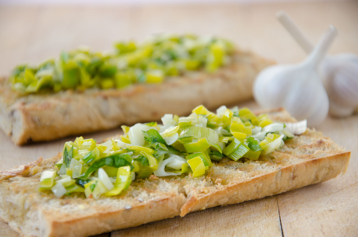 Leek,-garlic-and-olive-oil-mix-on-toasted-bread.jpg