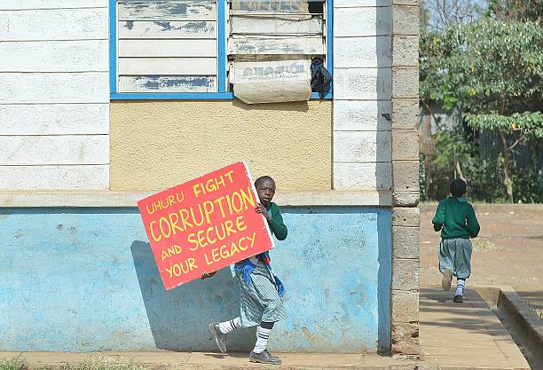 schoolchildren-from-the-langata-road-primary-flee-tear-gas-on-january-picture-id461762002.jpeg
