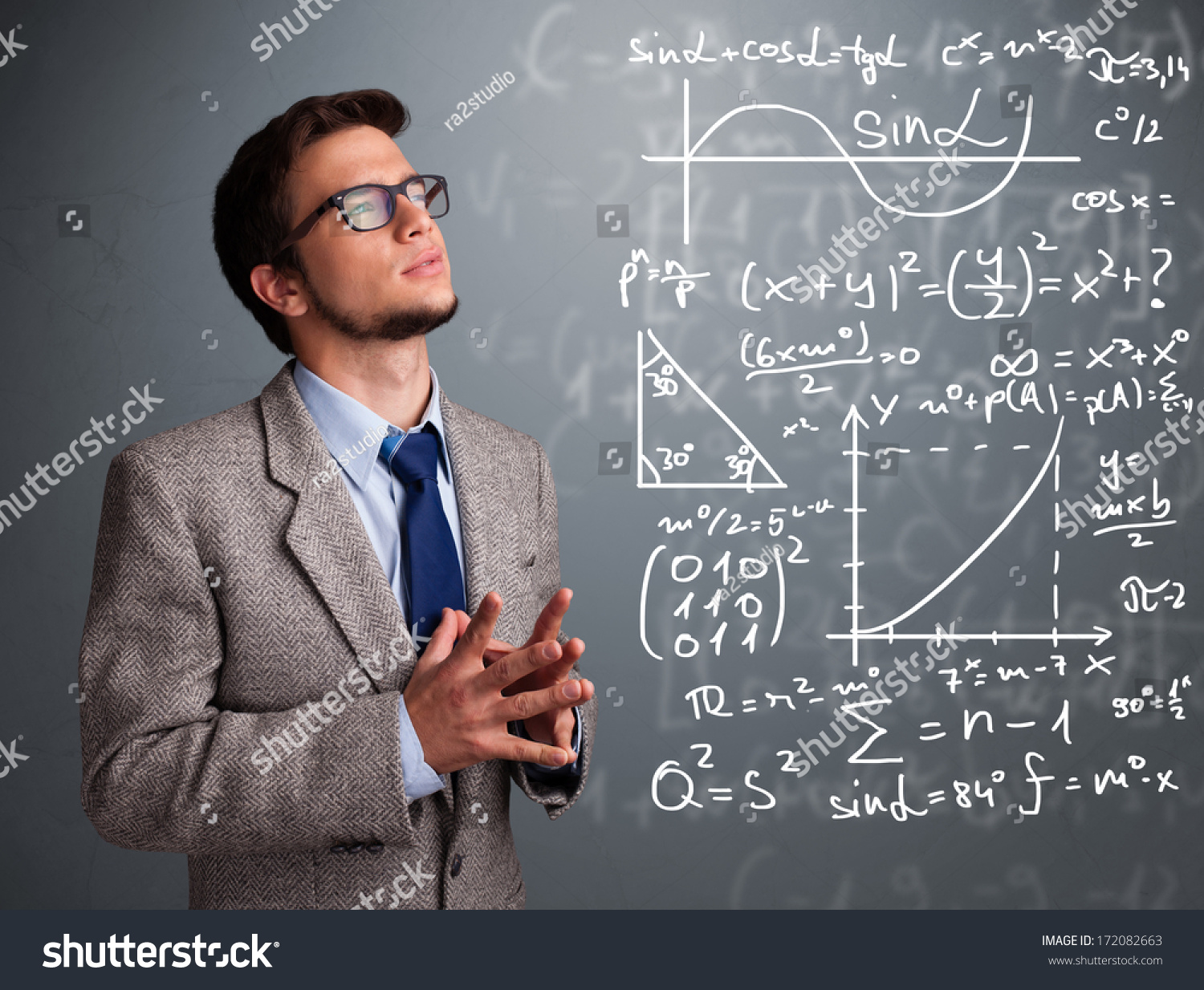 stock-photo-handsome-young-school-boy-thinking-about-complex-mathematical-signs-172082663.jpg