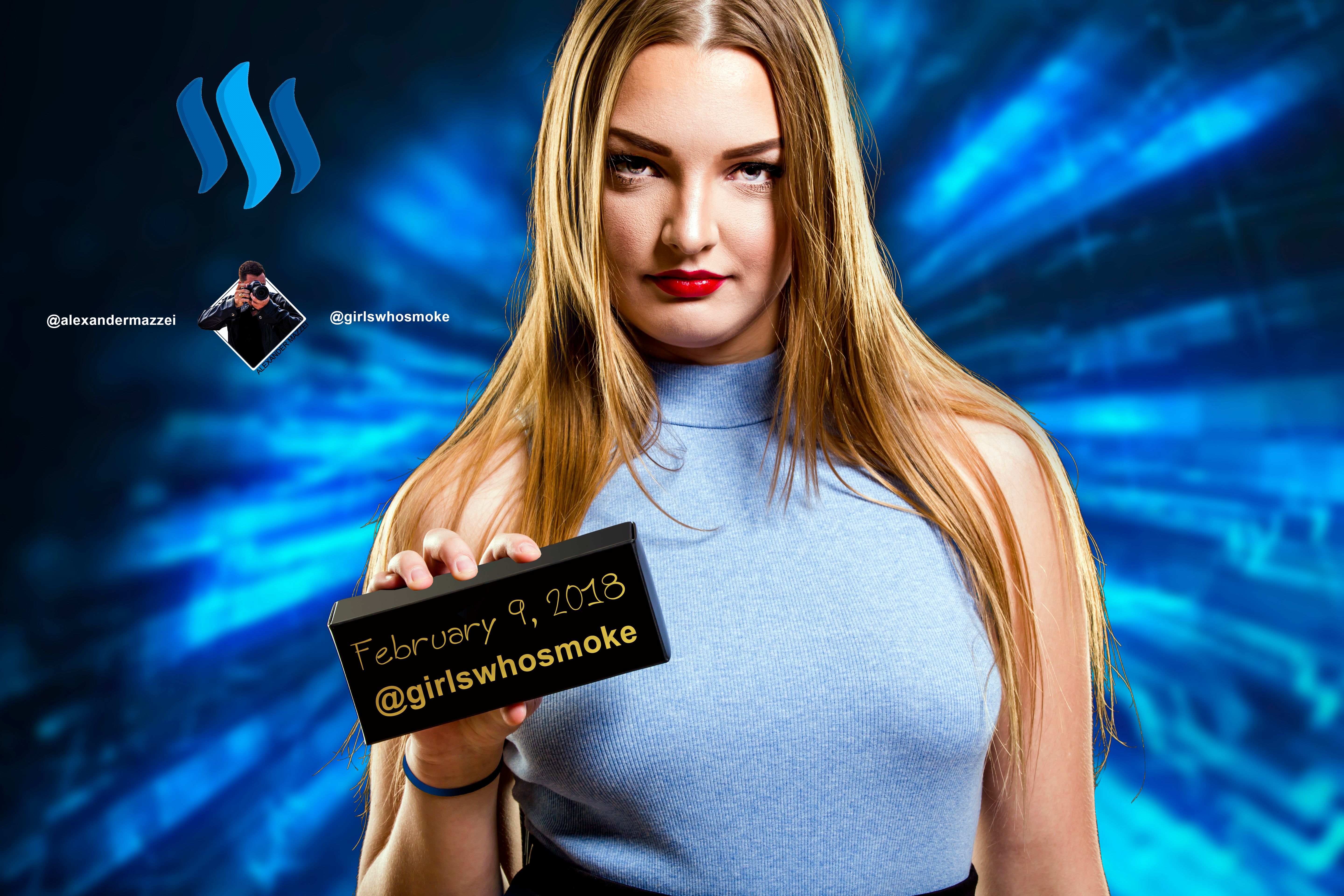 header image blonde female in blue shirt holding black box alexander mazzei.jpg